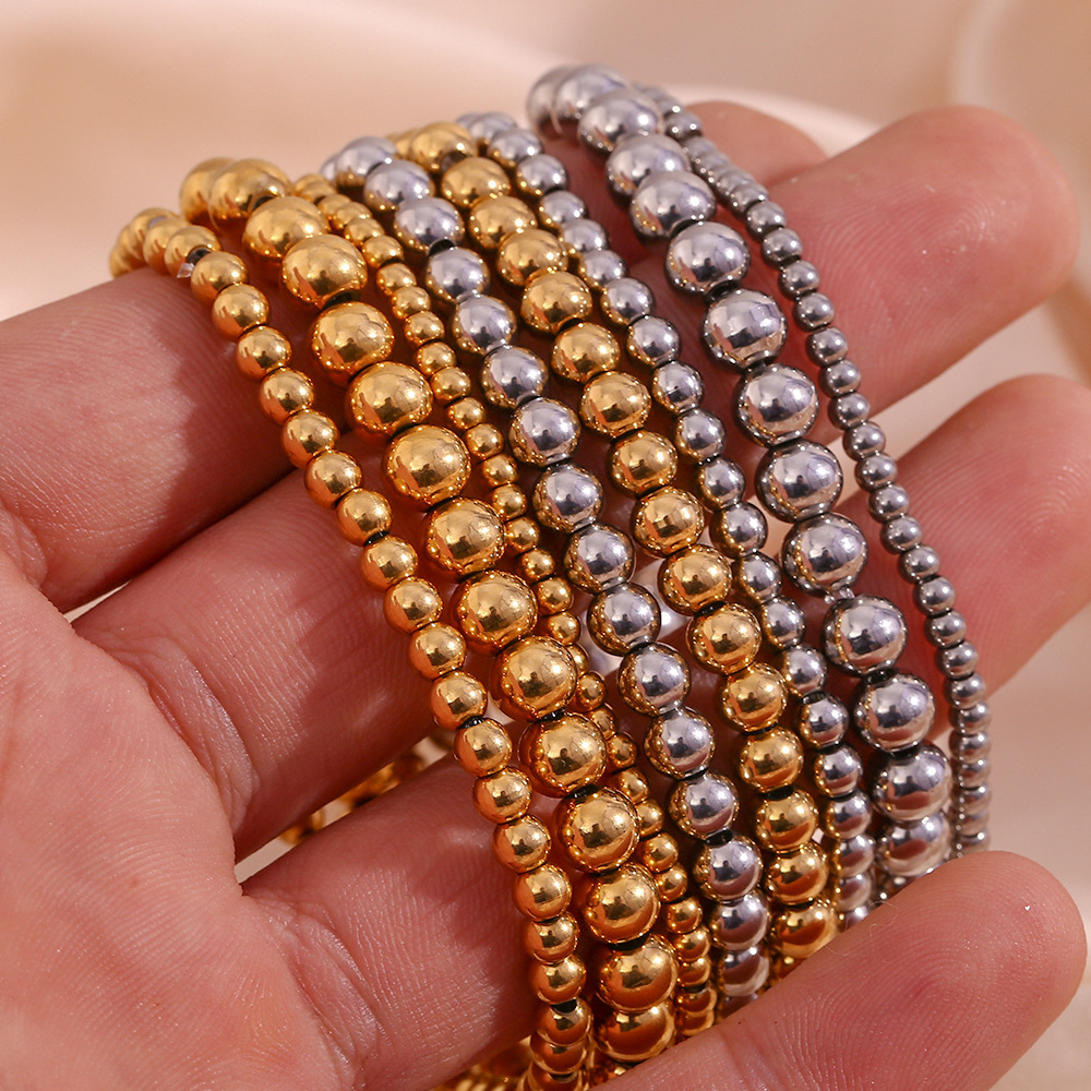 Crea - Elegantes stapelbares goldenes Metallarmband (4mm)