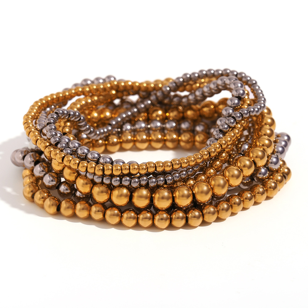 Crea - Elegantes stapelbares goldenes Metallarmband (4mm)