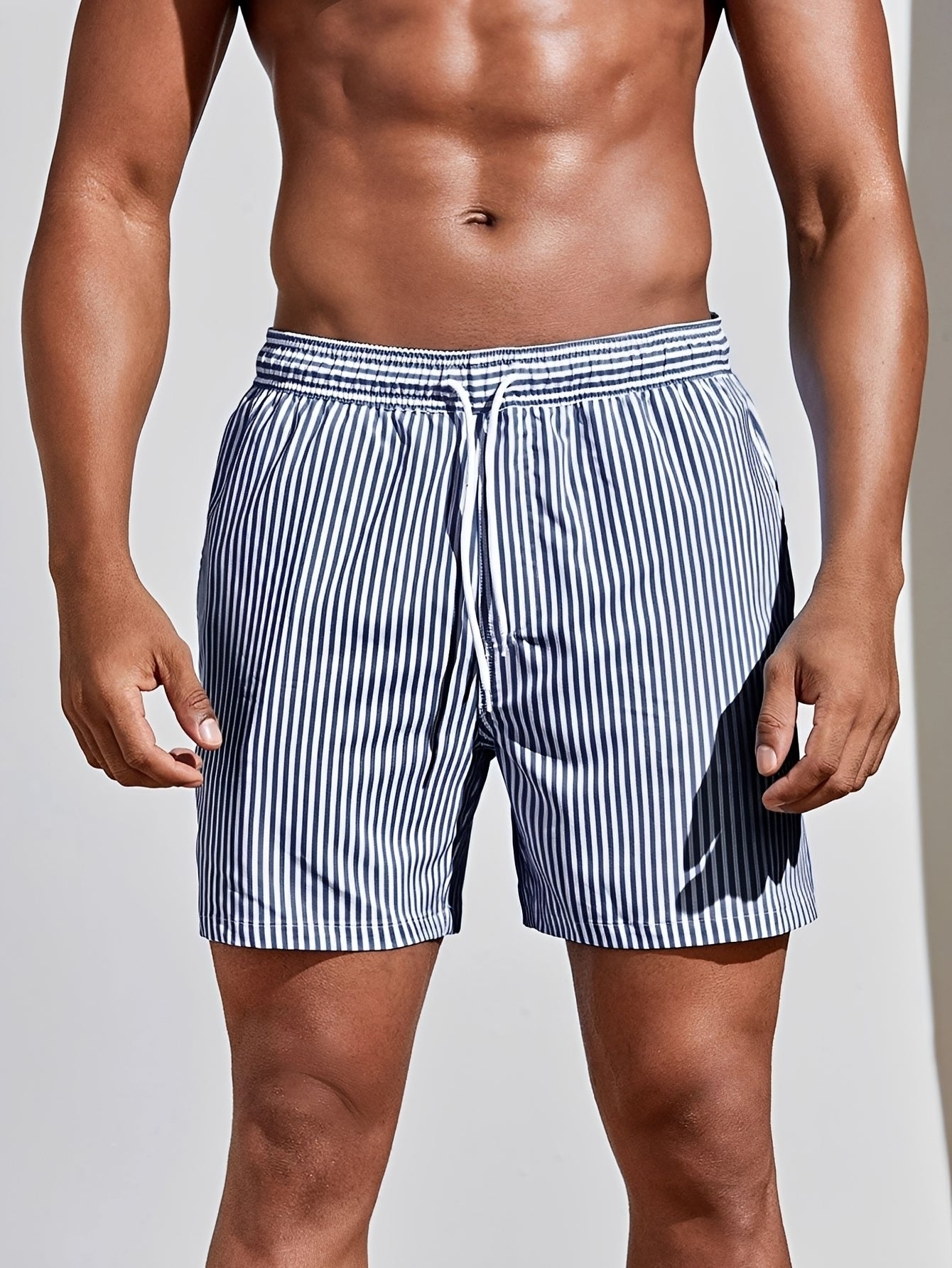 Reuben - Gestreifte und schnelltrocknende Badeshorts