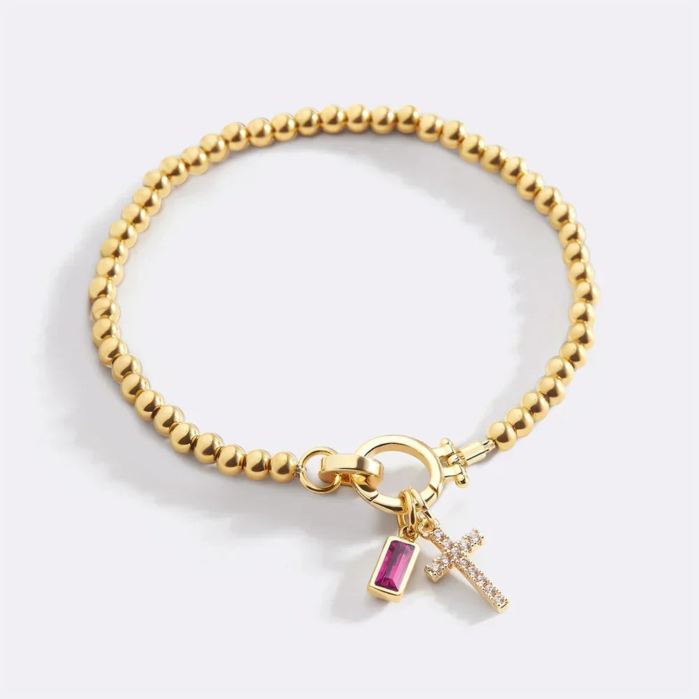 Eli – Geburtssteinarmband mit Kreuzanhänger