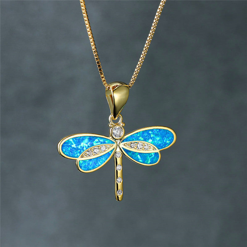 Maggie – Halskette mit goldener Libelle und Opal